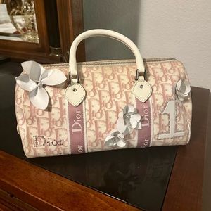 CHRISTIAN DIOR
Monogram Girly Boston Pink.